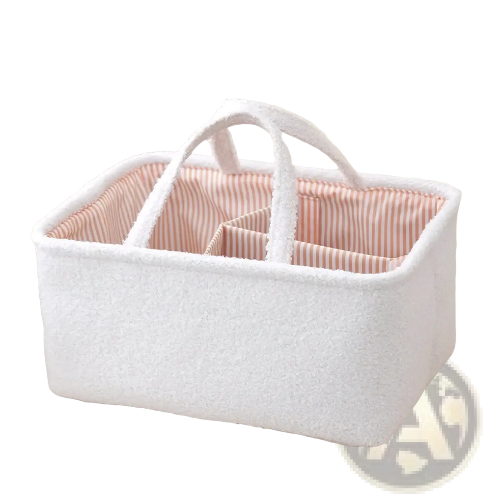 White textured fabric diaper caddy organizer with pink and white striped interior lining for nursery storage