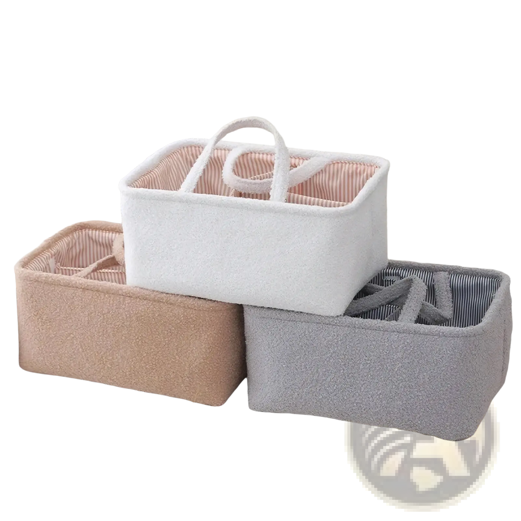 White woven fabric diaper caddy organizer with striped interior and looped handles for nursery storage