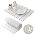White ceramic foldable slatted placemat made of diatomaceous earth stone for drying dishes efficiently