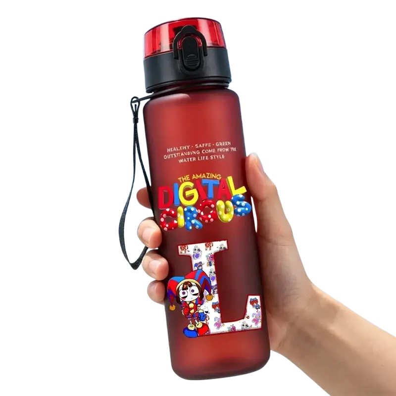 A translucent red digital circus water bottle with a black lid, carrying strap, and colorful cartoon design