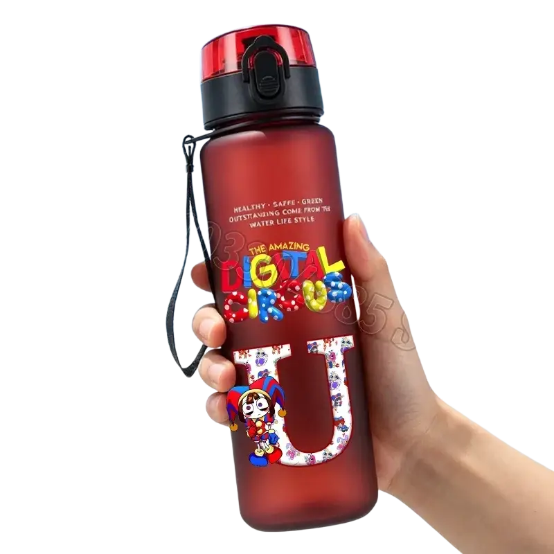 A translucent red digital circus water bottle with straw featuring colorful cartoon decals and a black lid and strap