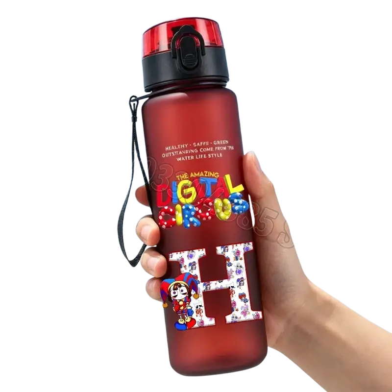 A translucent red digital circus water bottle with straw featuring colorful lettering and cartoon character decals