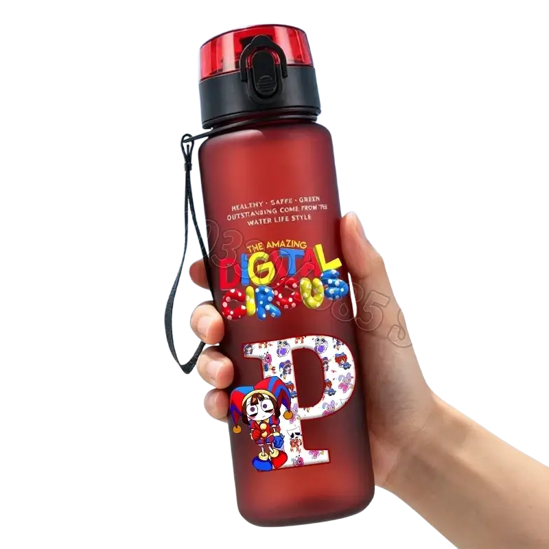 A translucent red digital circus water bottle with straw black lid carrying strap colorful lettering and cartoon decals