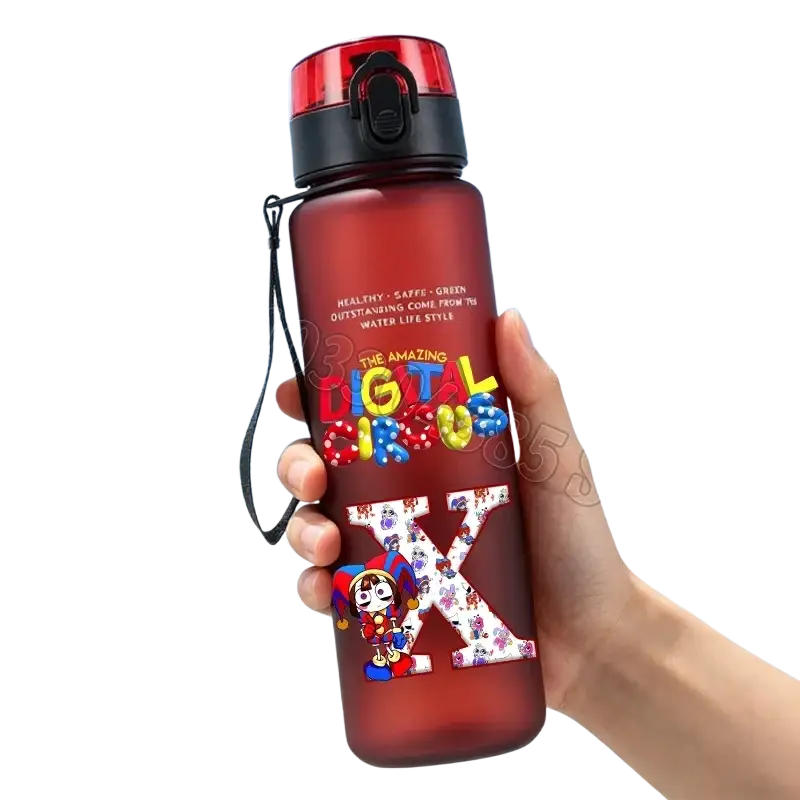 A translucent red digital circus water bottle with straw 650ml featuring colorful lettering and cartoon decals