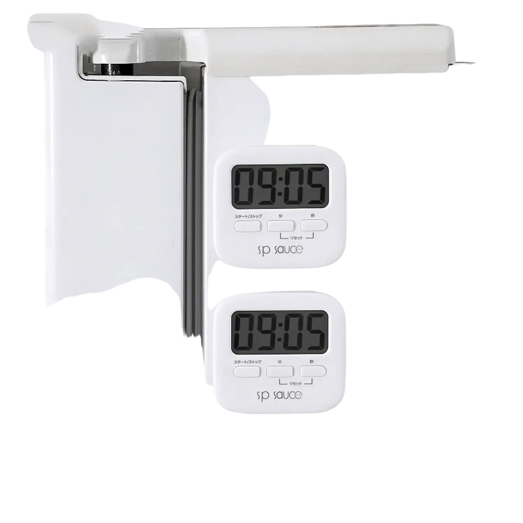 Two white digital kitchen timers with black lcd displays and three buttons by sp sauce for magnetic countdown timing