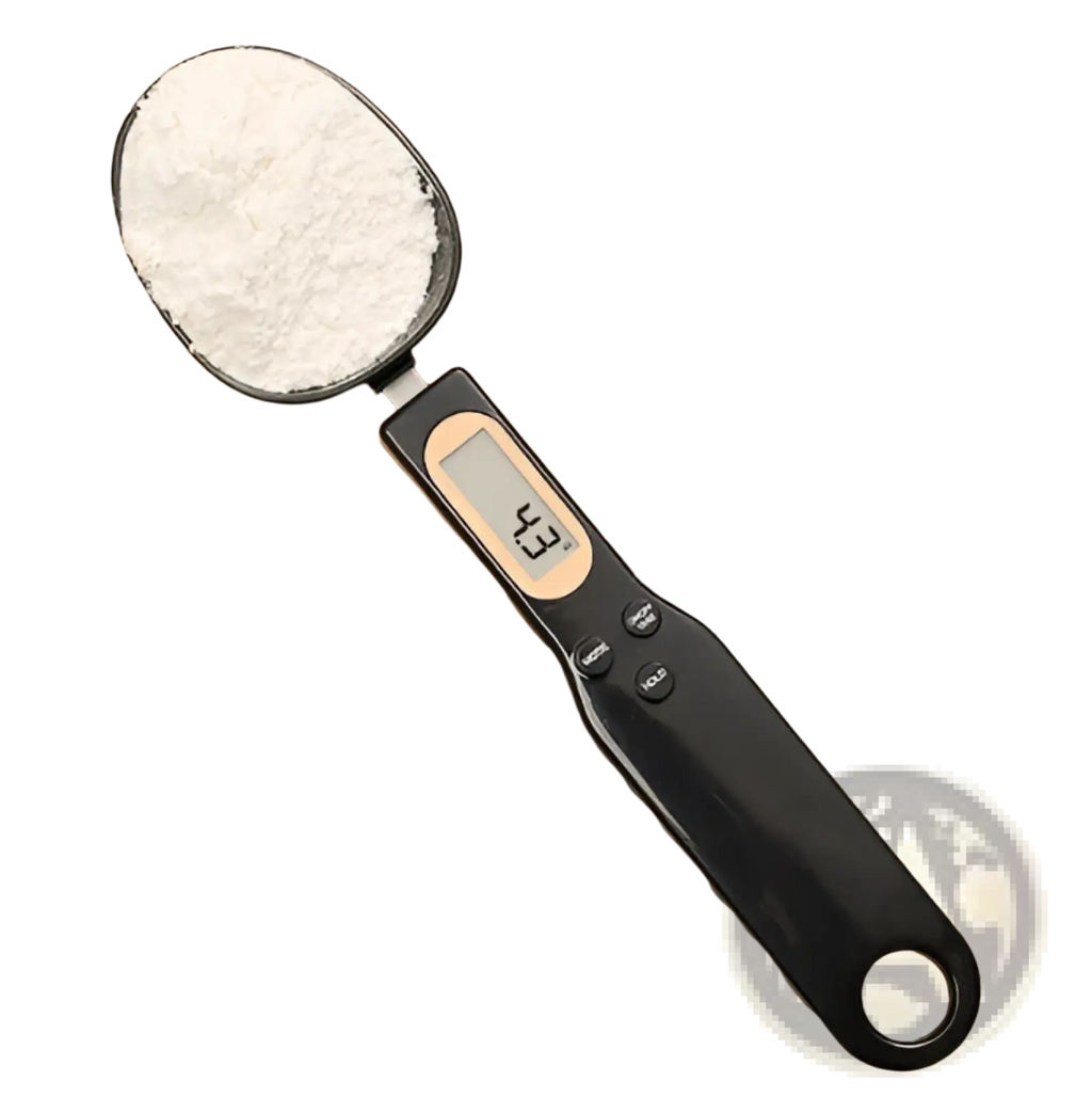 Black digital spoon scale with gold-accented lcd display showing 43 grams measuring white powder accurately