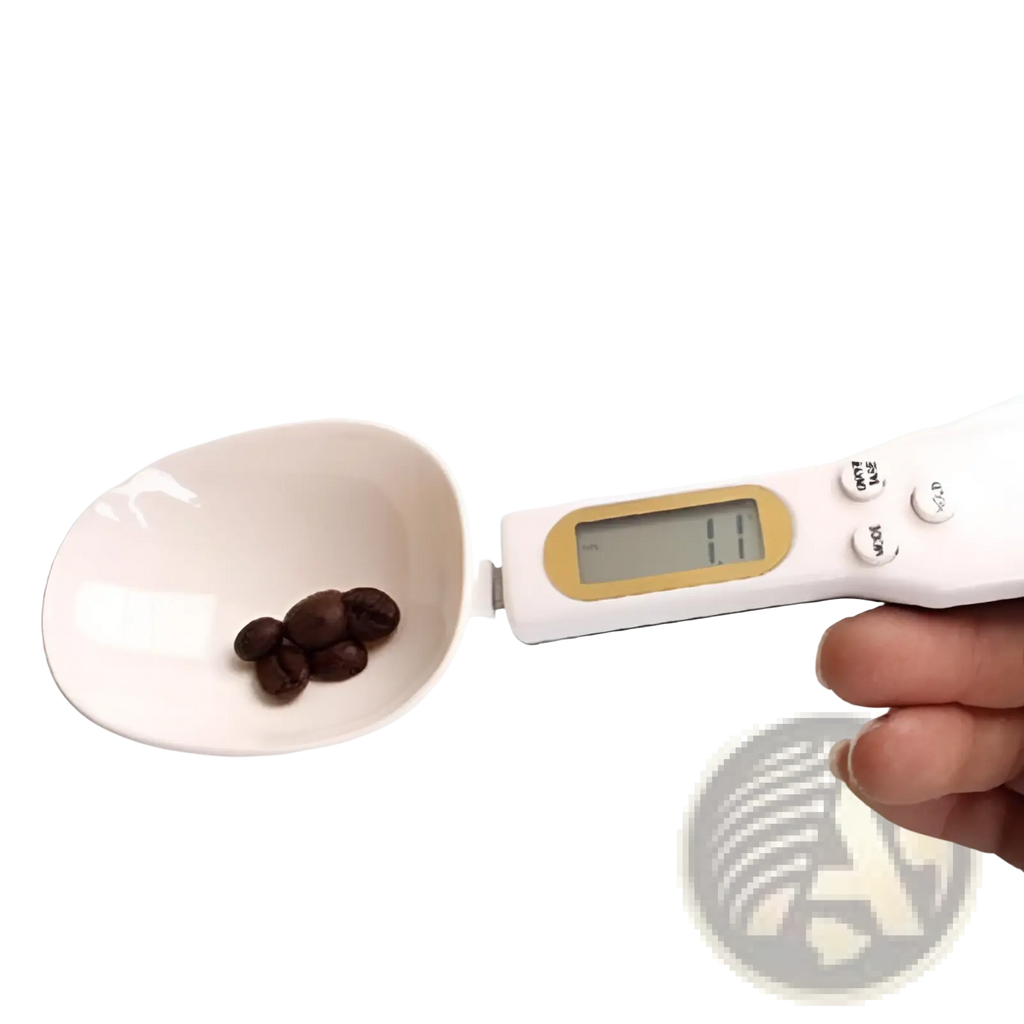 White digital spoon scale with lcd screen and three buttons holding dark brown coffee beans for kitchen measuring tool