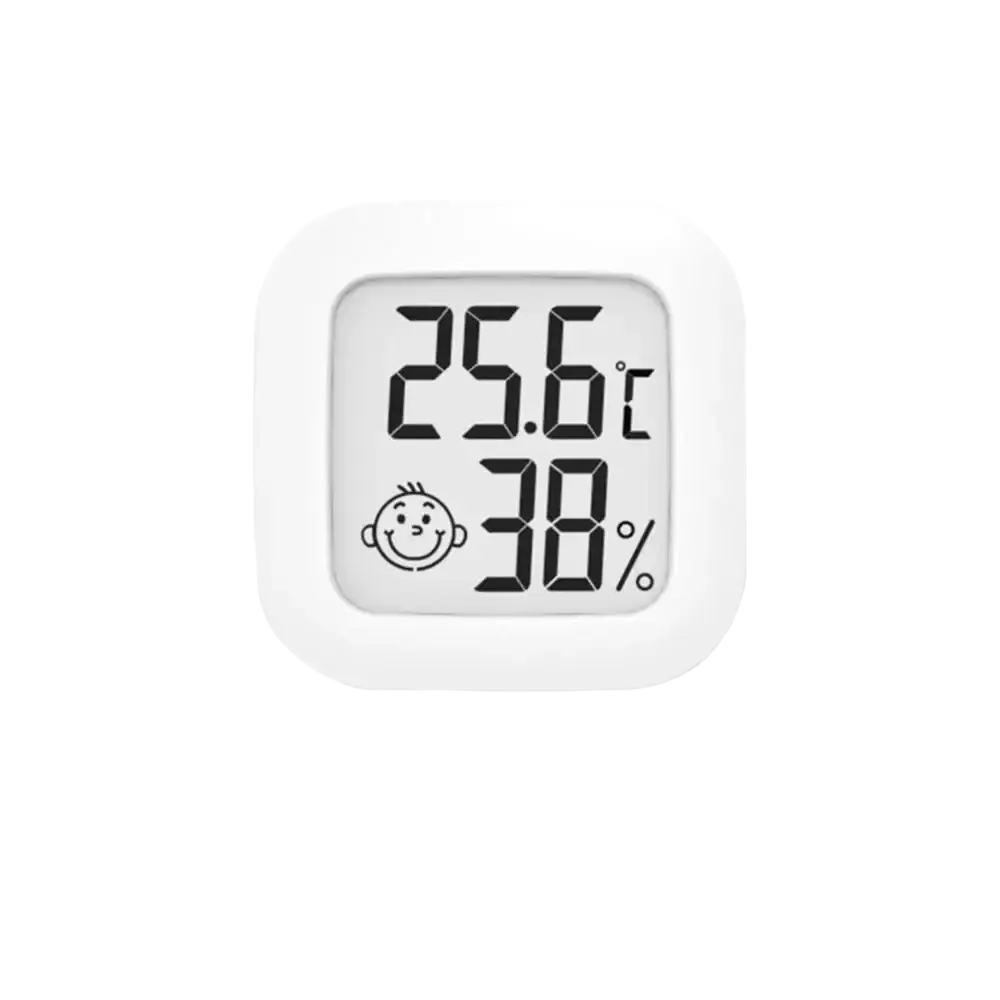 White square digital thermometer and hygrometer with smiling face icon showing 25.6°c temperature and 38% humidity
