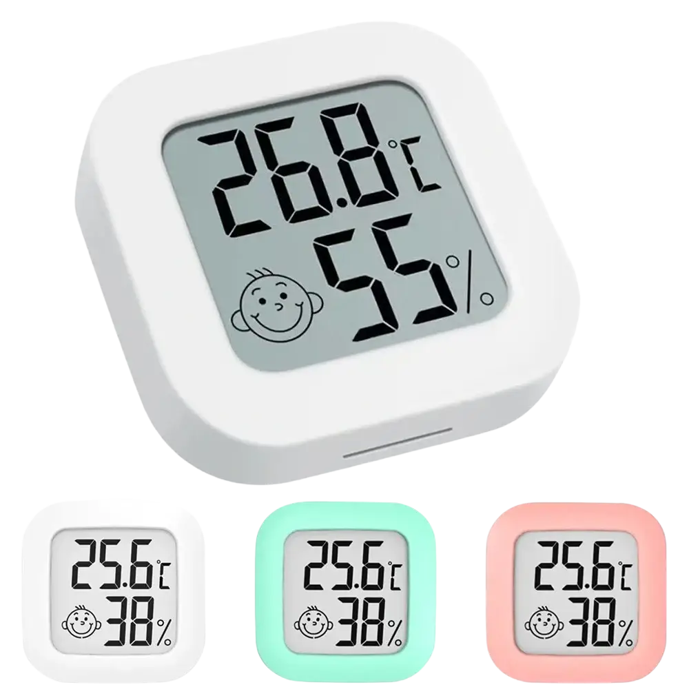 White square digital thermometer and hygrometer room sensor with smiling face icon and wide measurement range display