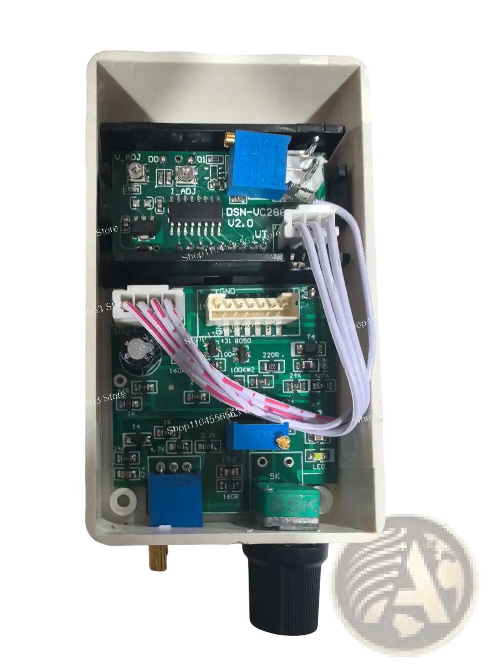White plastic enclosure housing green circuit boards labeled dsn-uc28f v2.0 for digital voltage current regulator 50a 60a 100a