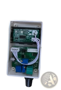 White plastic housing of digital voltage current regulator 50a 60a 100a showing two green circuit boards and black knob