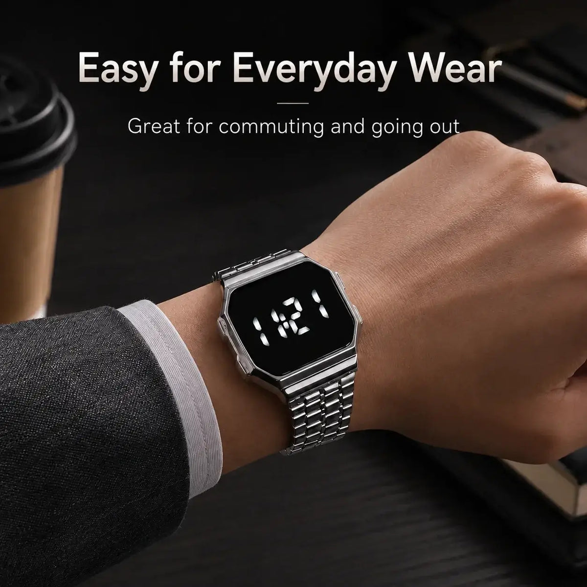 Silver digital watch with quartz movement, octagonal digital display, and smart casual steel strap link band