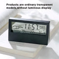 Black rectangular digital weather desktop alarm clock with transparent display showing time date weather temperature and humidity