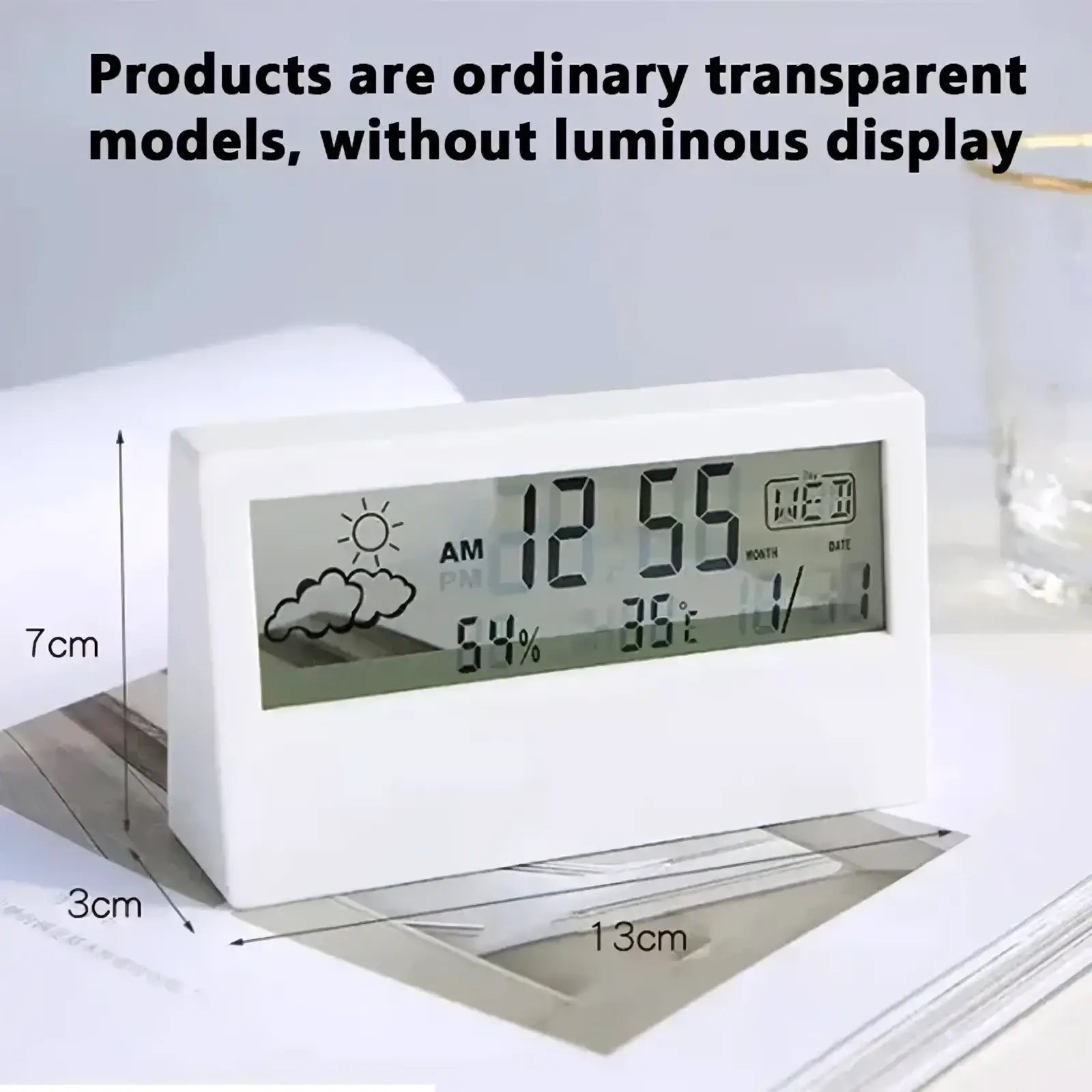 White rectangular digital weather desktop alarm clock with transparent display showing time temperature humidity and date