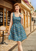 Dino Jungle cotton fit and flare dress in teal with floral print sleeveless a-line design and square neckline