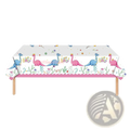 White plastic dinosaur birthday tablecloth with pink blue cartoon dinosaurs crowns floral designs scalloped border