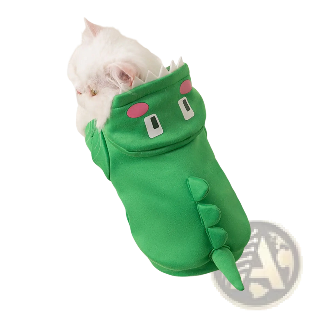 Green dinosaur-themed plush pet hoodie with pink and white facial features and stitched tail for cats