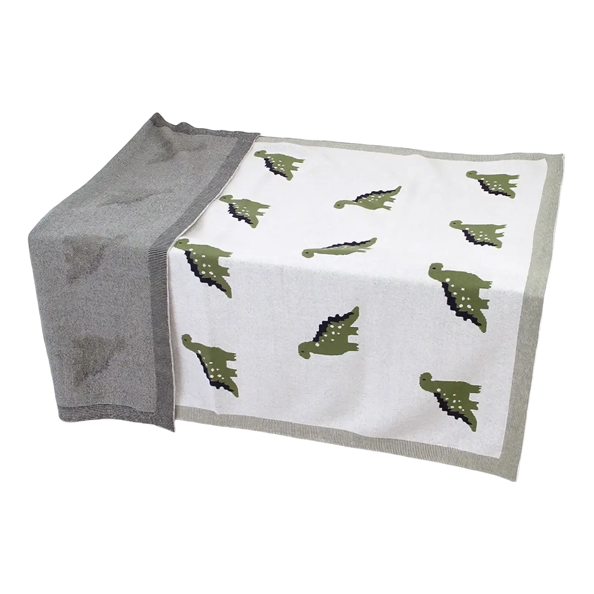 A soft white cotton dinosaur knit baby blanket with green prints and a gray border for crib use
