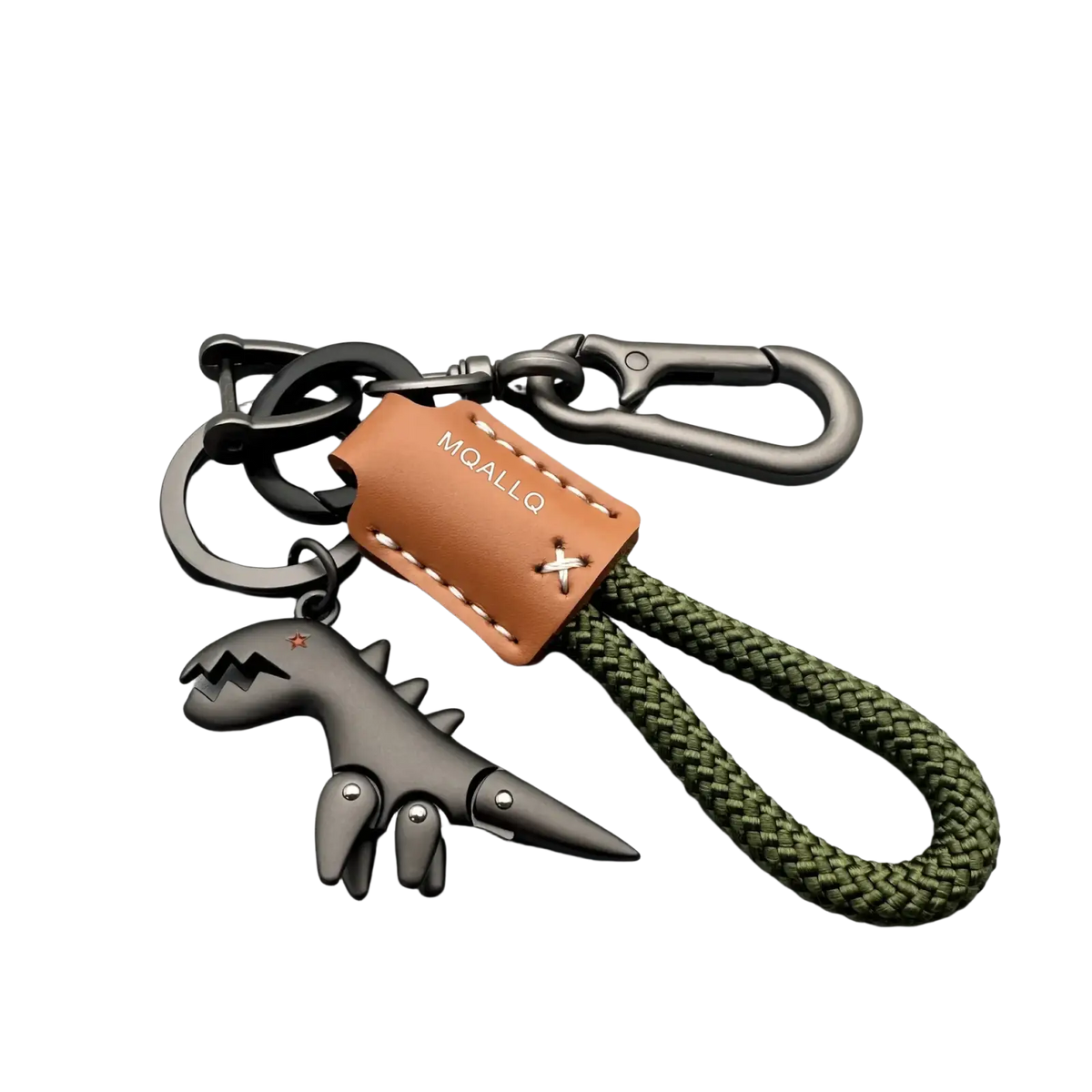 Black dinosaur-shaped metal key fob with tan leather tag and olive green braided rope keychain accessory