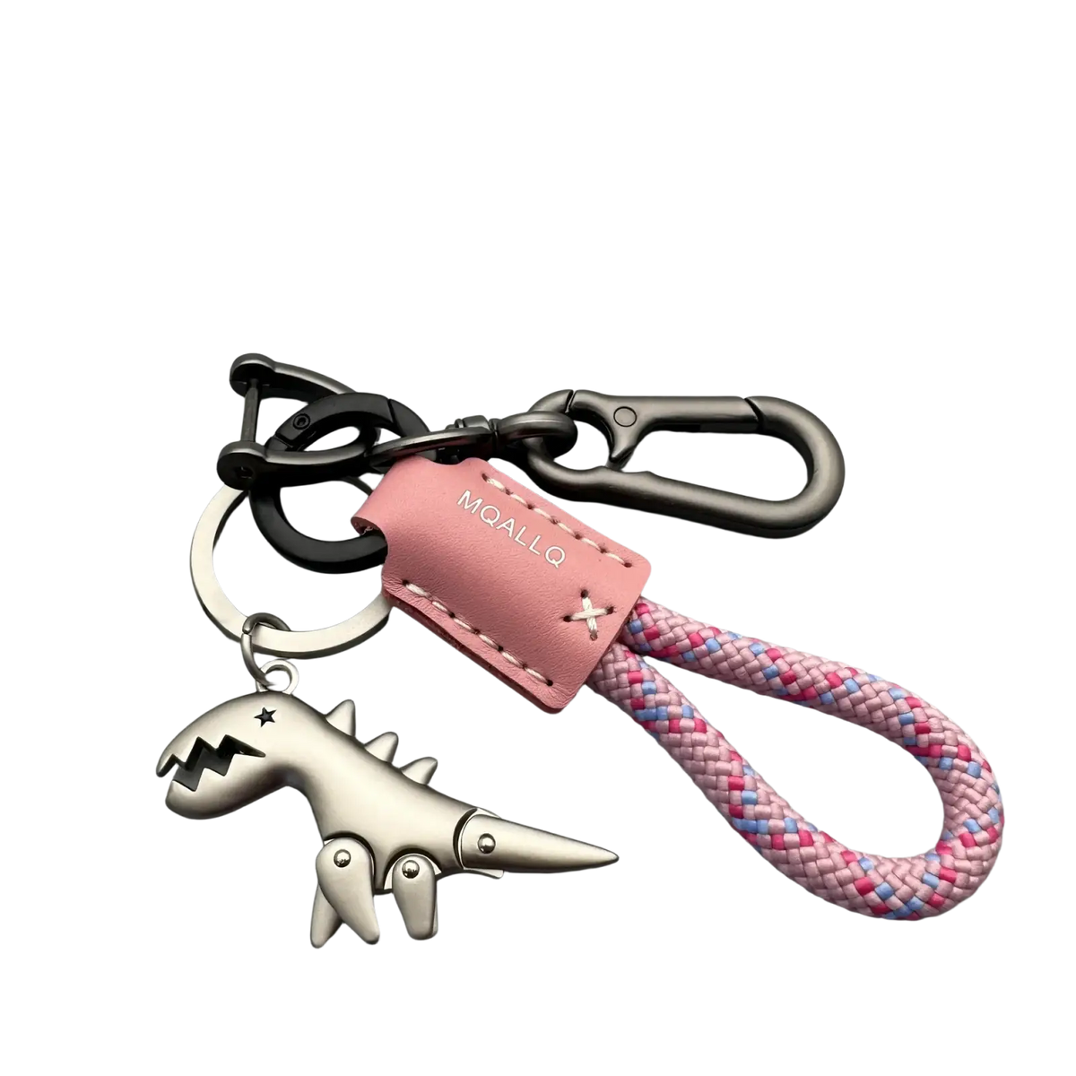 A pink leather braided keychain with white stitching and moallq tag featuring a silver dinosaur charm and black carabiners