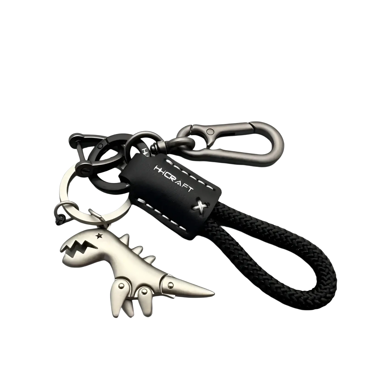 Silver dinosaur leather braided keychain with black leather strap and metal carabiner key fob accessory