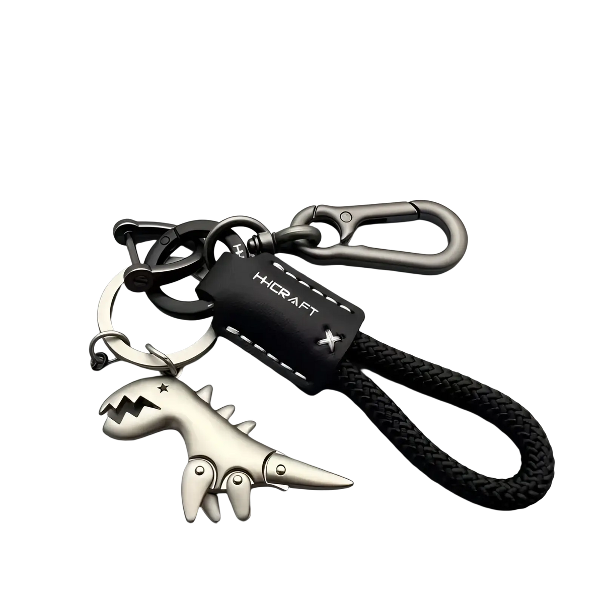 Silver dinosaur-shaped leather keychain bag pendant with black braided cord and hicraft leather brand tag
