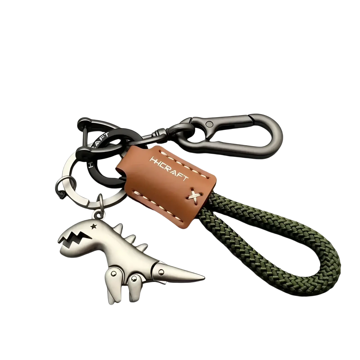 Silver dinosaur leather keychain bag pendant with a brown leather tag and olive green braided cord