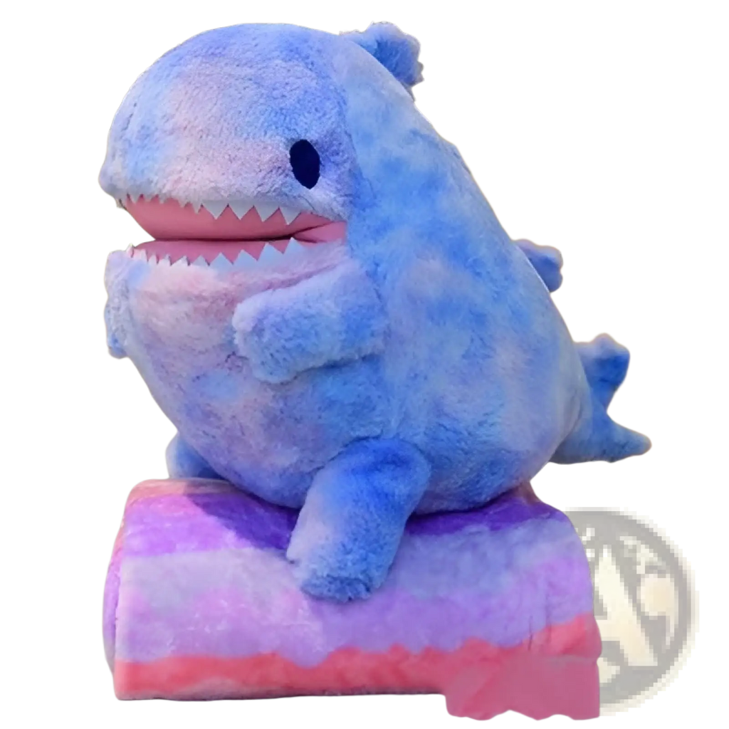 A plush blue shark with a pink mouth and white teeth sitting on a gradient purple and pink cushion 60cm doll