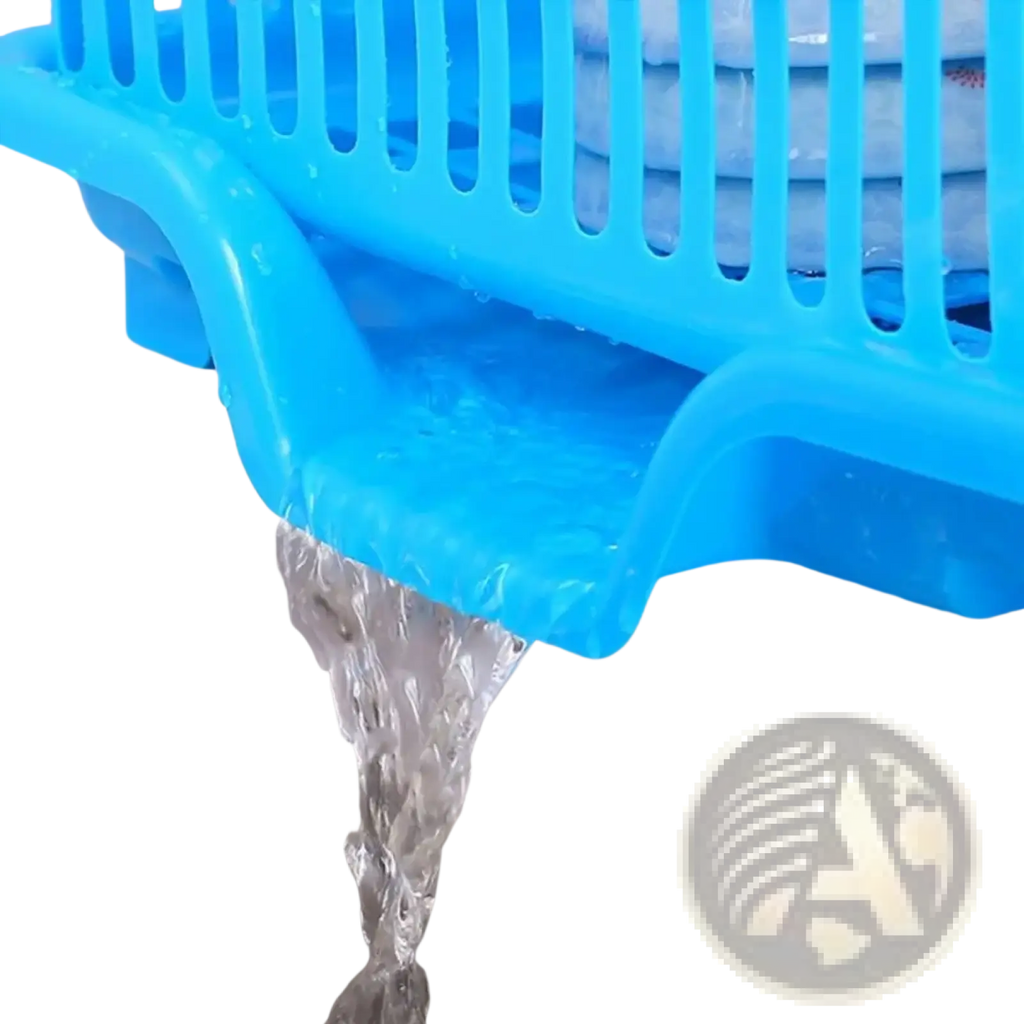 Bright blue plastic dish drying rack with vertical slats and curved water channel for countertop organization
