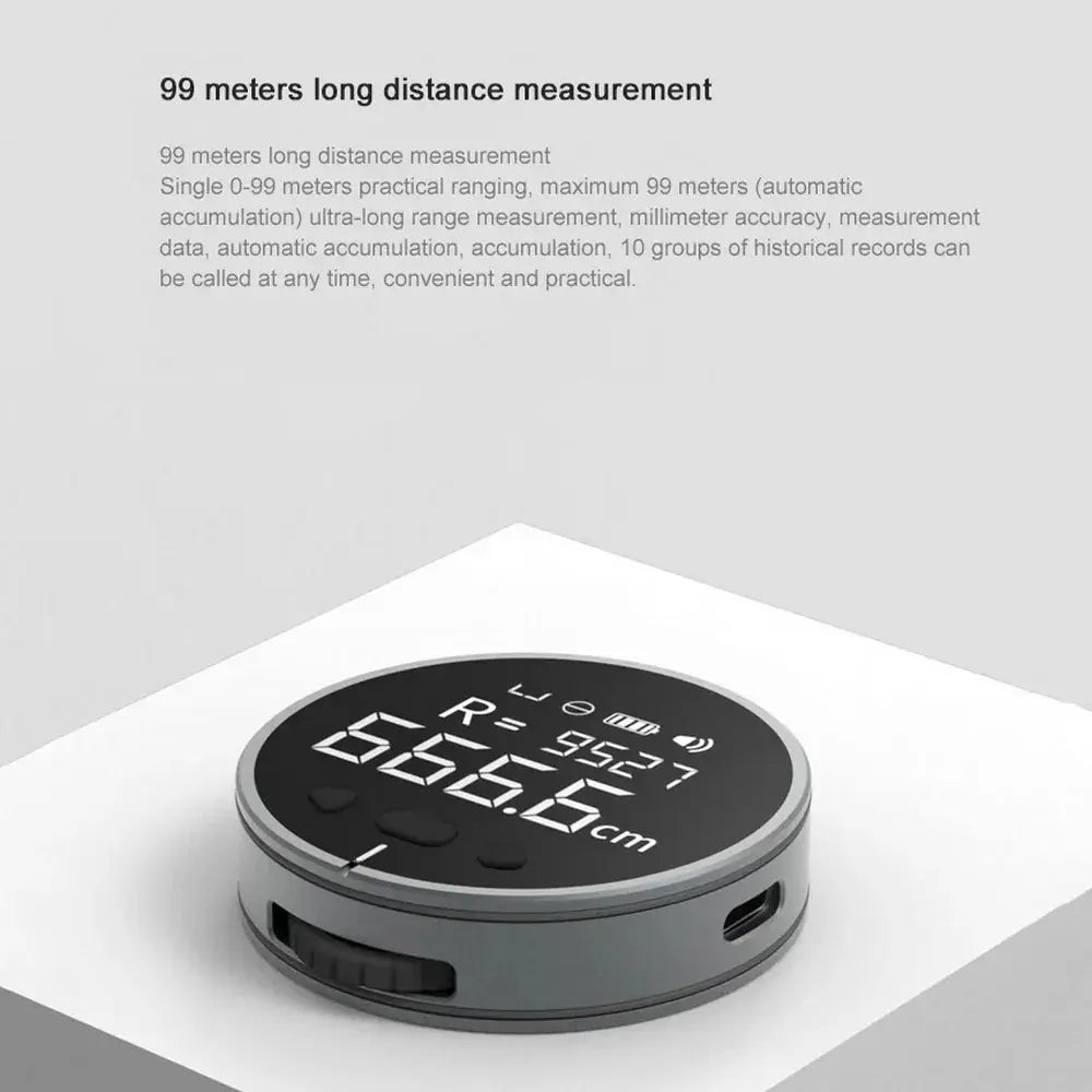 Gray circular arbaglobal digital lcd electronic distance measuring ruler with black display showing 666.0 cm and usb port