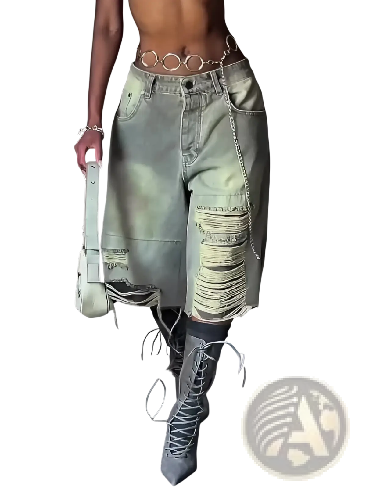Distressed cropped denim pants in light-wash denim with ripped and frayed detailing styled with a chain belt and boots