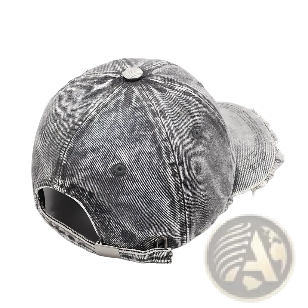 Distressed denim baseball cap in gray with a frayed brim and adjustable strap shown from the back side
