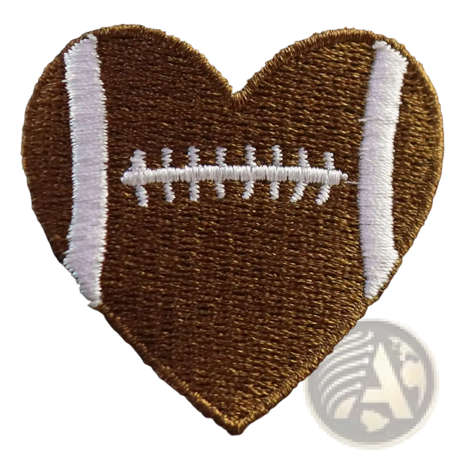 Brown heart-shaped embroidered football patch with white laces and stripes on distressed denim baseball cap