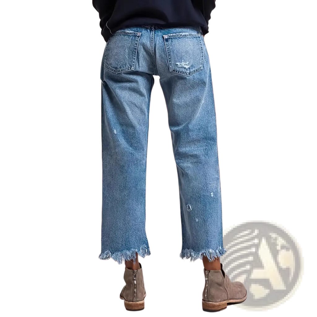 Distressed gray ripped straight jeans in light-wash denim with frayed hems and subtle distressing