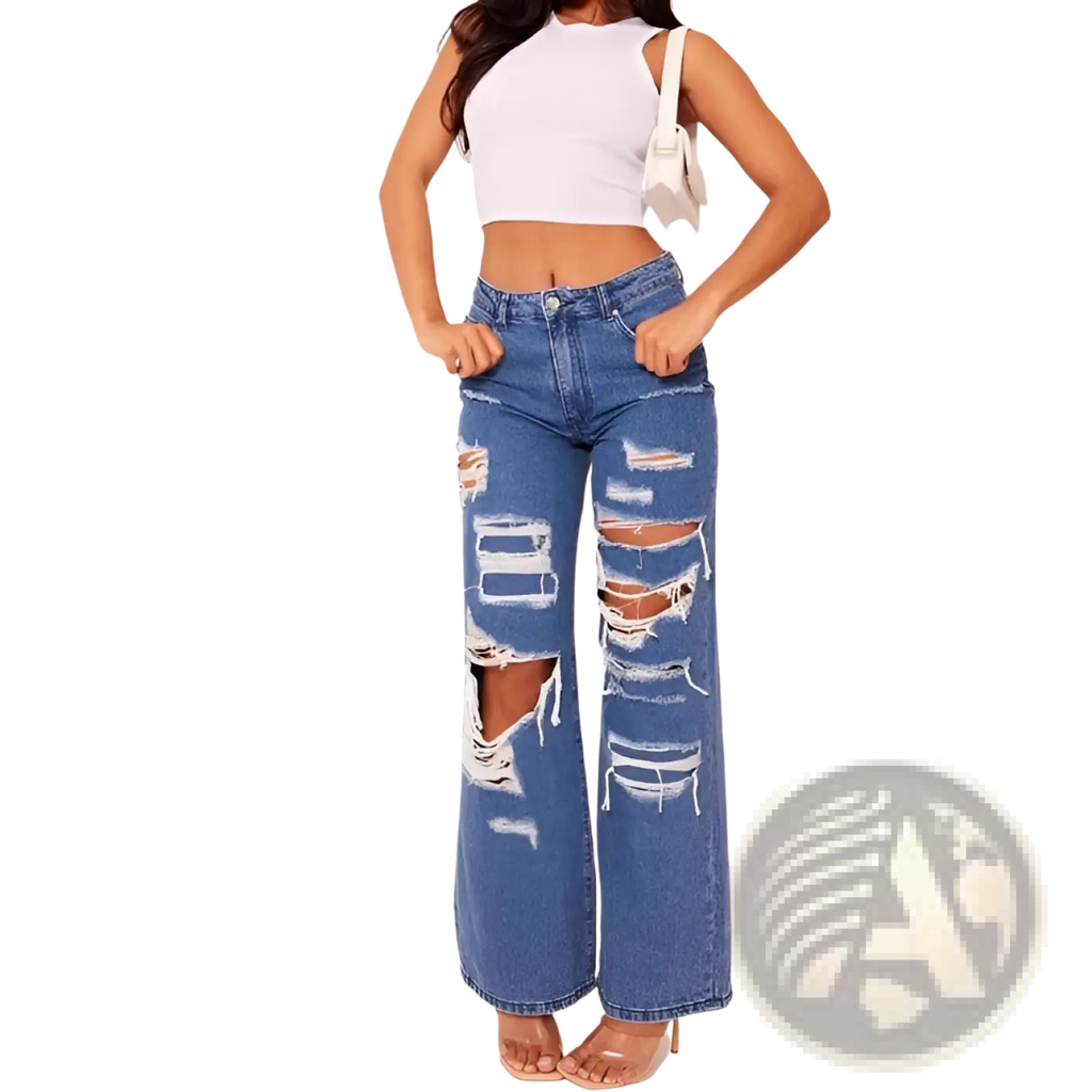 Distressed high waist light wash denim jeans in blue with wide legs, multiple ripped patches, and frayed edges