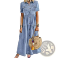 A light blue denim dress with short sleeves button-front closure and chest pockets from the distressed multi buckle tiered denim maxi shirt dress collection