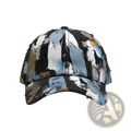 A distressed paint splatter cotton baseball cap in black white light blue and mustard yellow on denim fabric