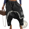 Distressed patchwork denim harem pants in dark wash with frayed edges and a casual, relaxed fit