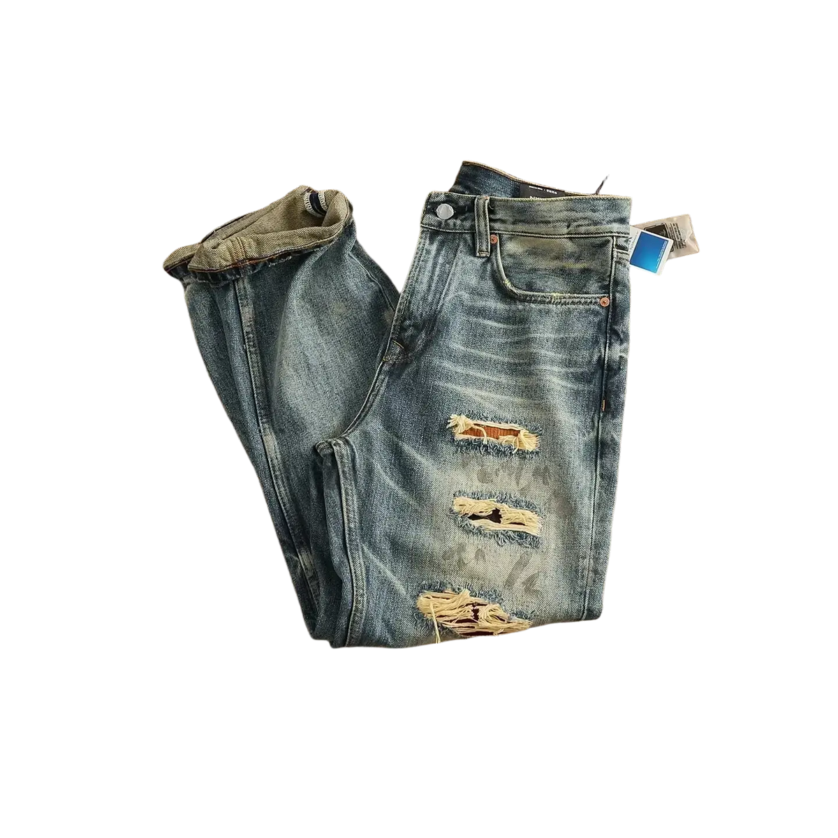 Distressed patchwork denim jeans men featuring blue distressed patchwork denim with intentional rips and frayed edges