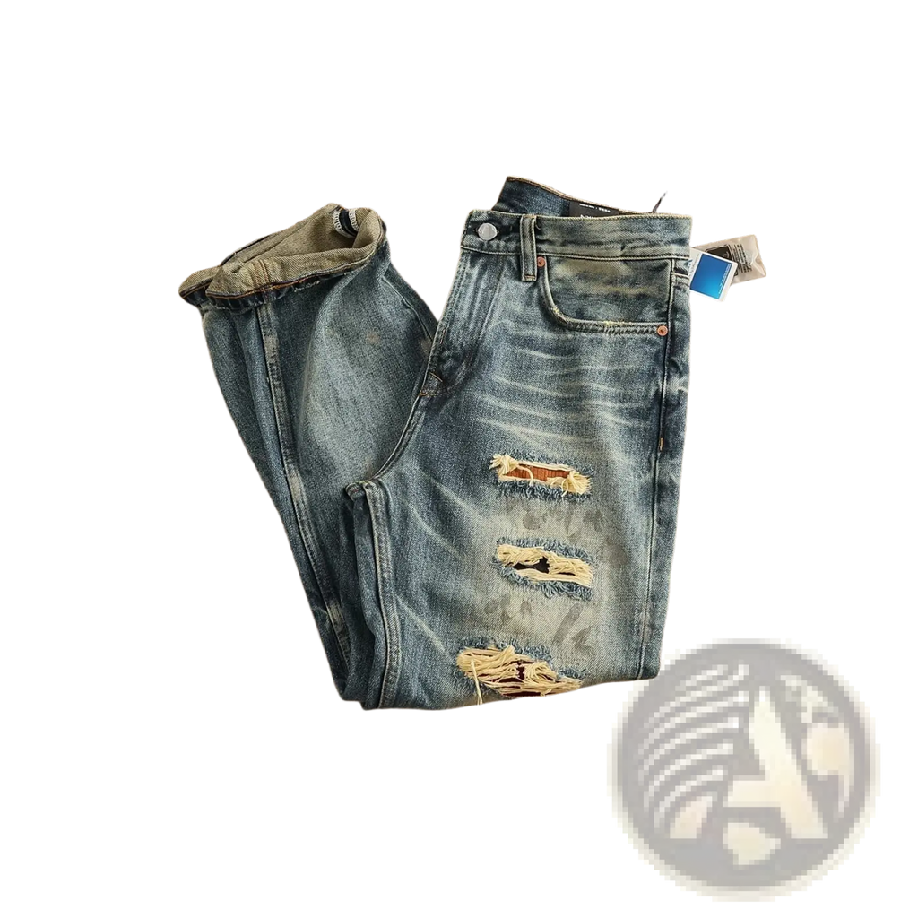 Distressed patchwork denim jeans men in blue with intentional rips and frayed edges made of durable denim