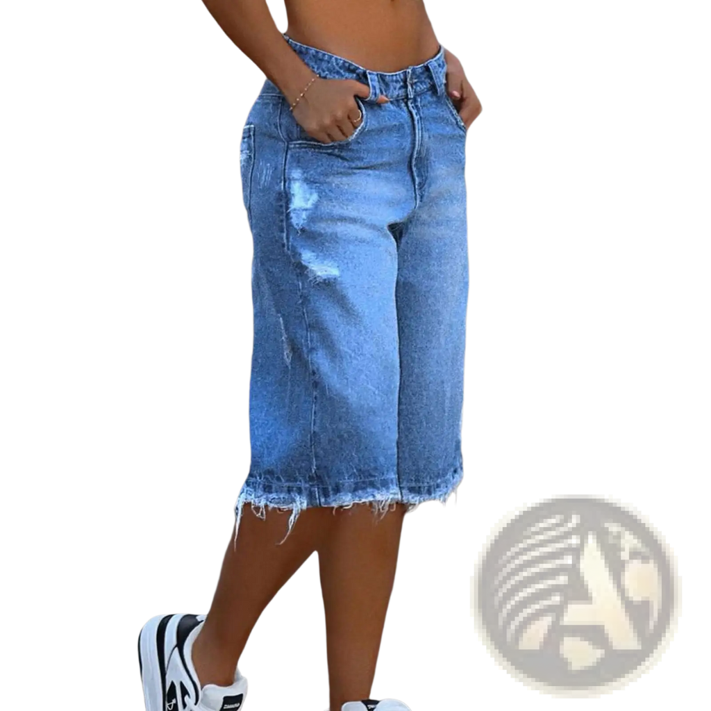 Light-wash distressed ripped denim capri pants with frayed hems made of cotton denim for casual wear