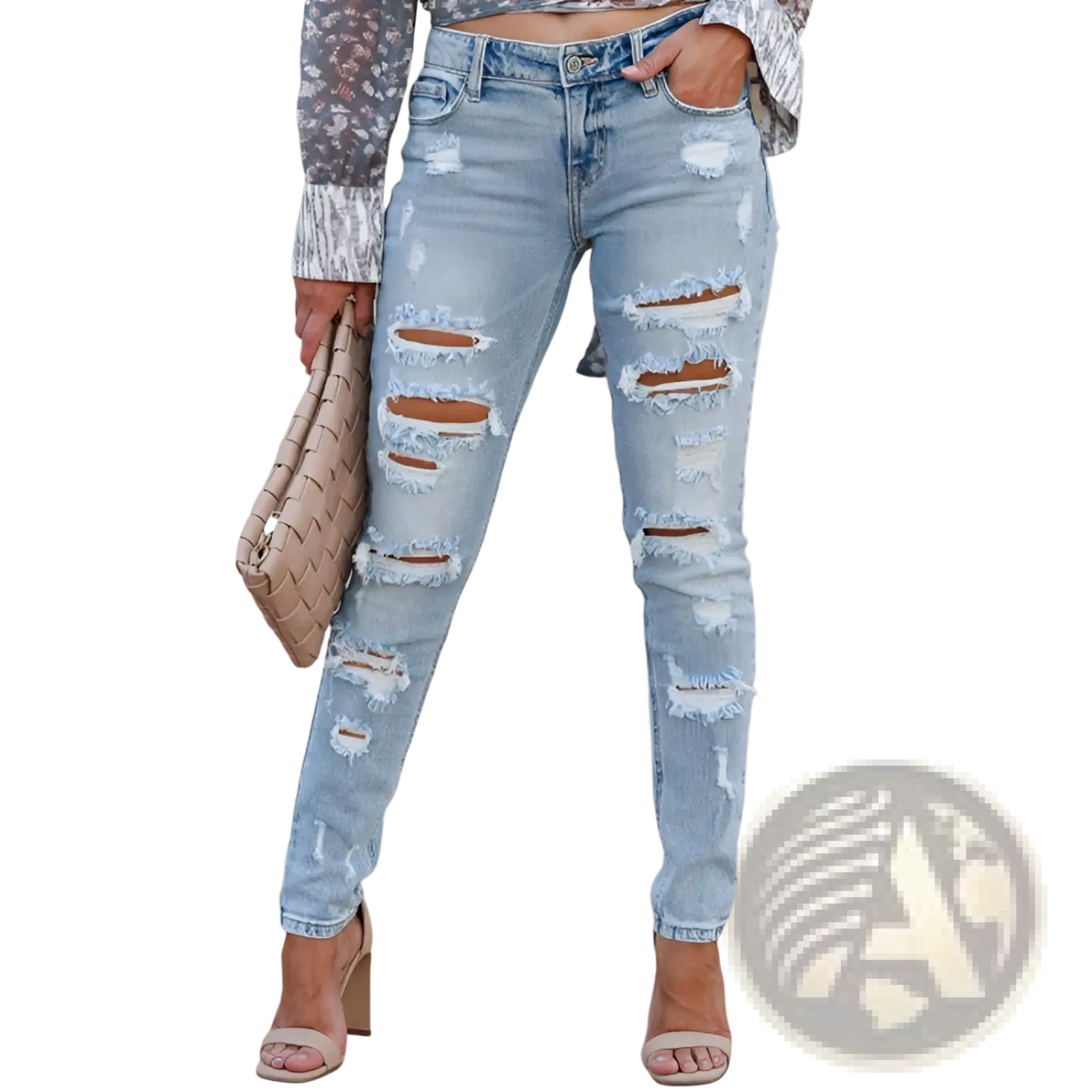 Distressed ripped skinny denim pants in light-wash denim with multiple rips and frayed edges