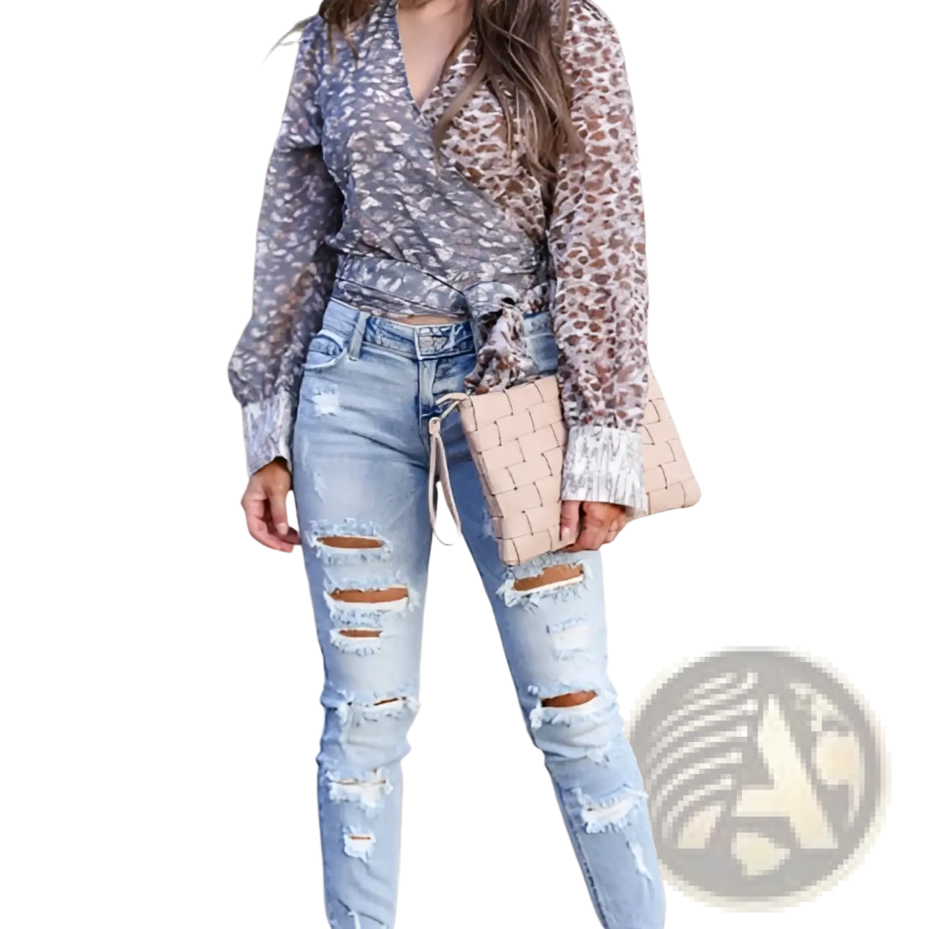 Beige woven clutch with drawstring closure complementing distressed ripped skinny denim pants for casual style