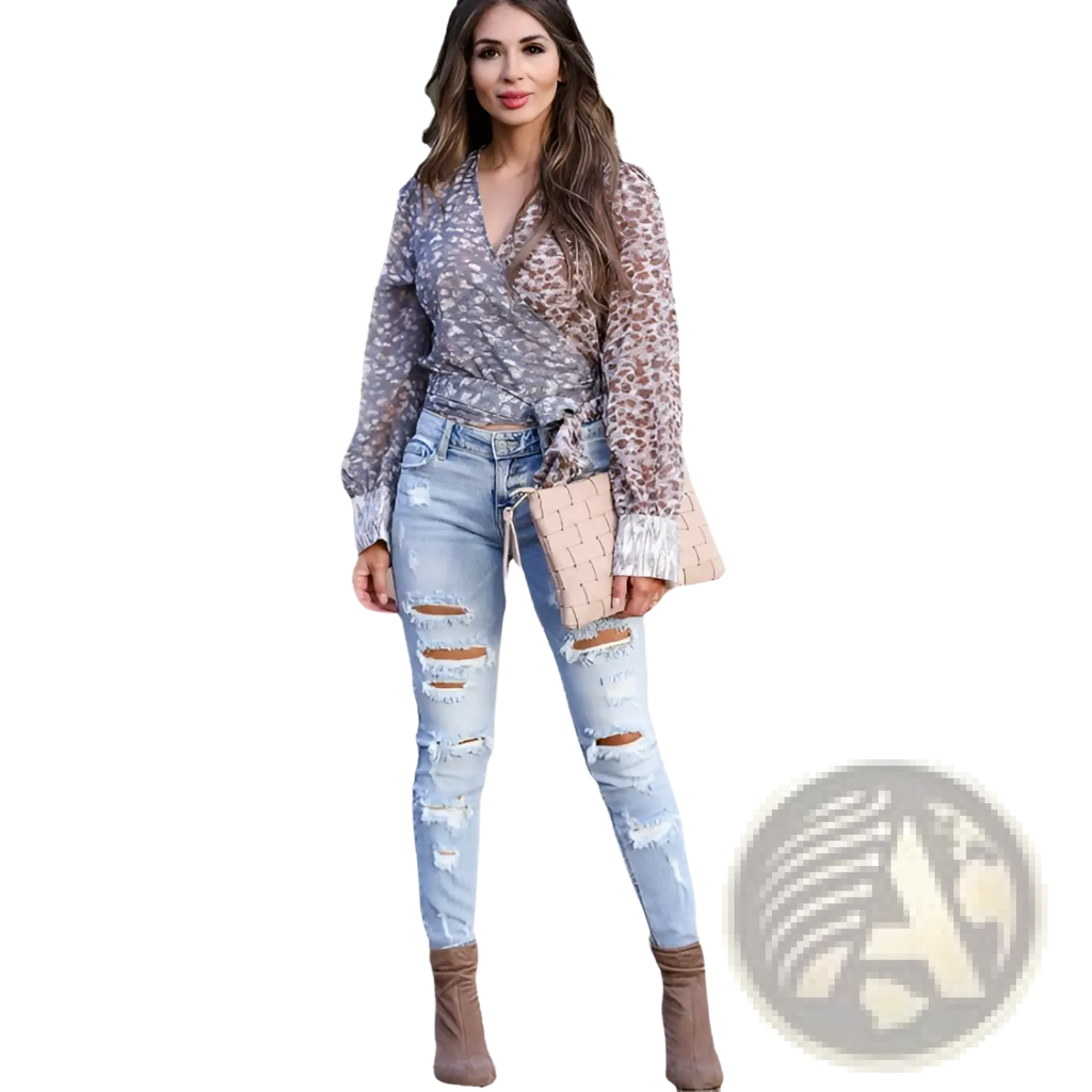 A beige woven clutch with a textured basketweave pattern paired with distressed ripped skinny denim pants