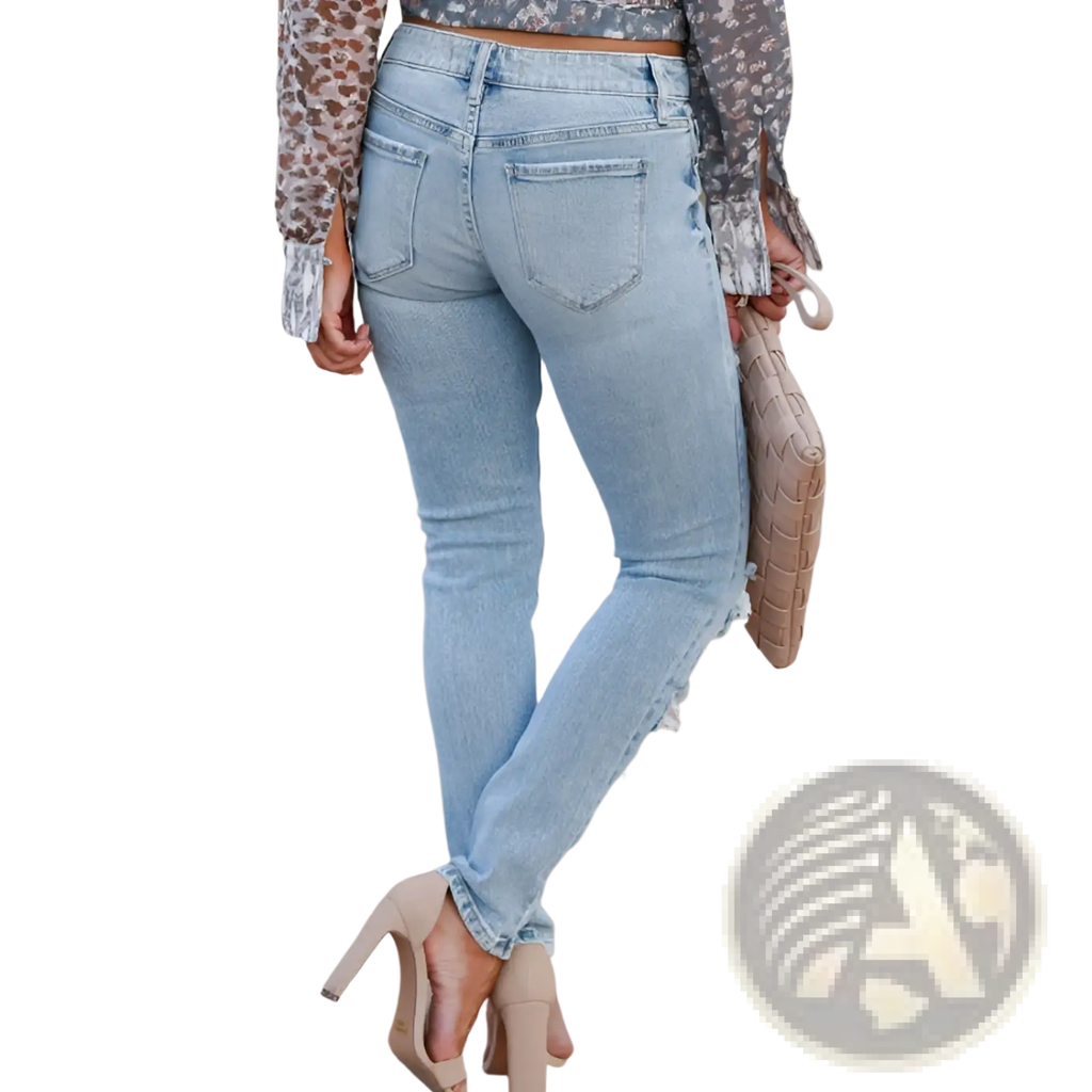 Light-wash slim fit distressed ripped skinny denim pants with ripped details along the cuffs