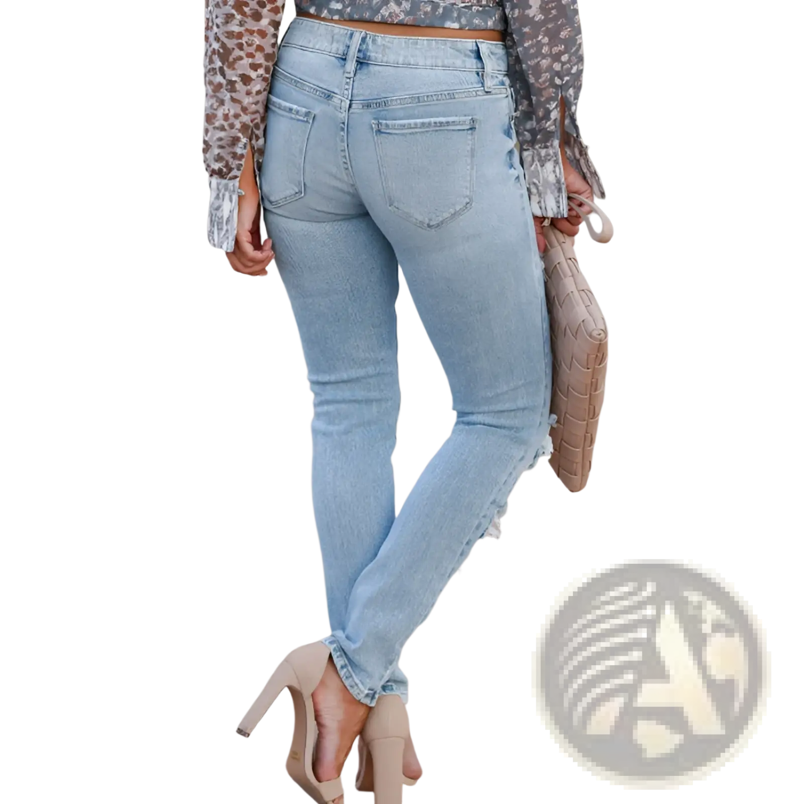 Light-wash slim fit distressed ripped skinny denim pants with ripped details along the cuffs