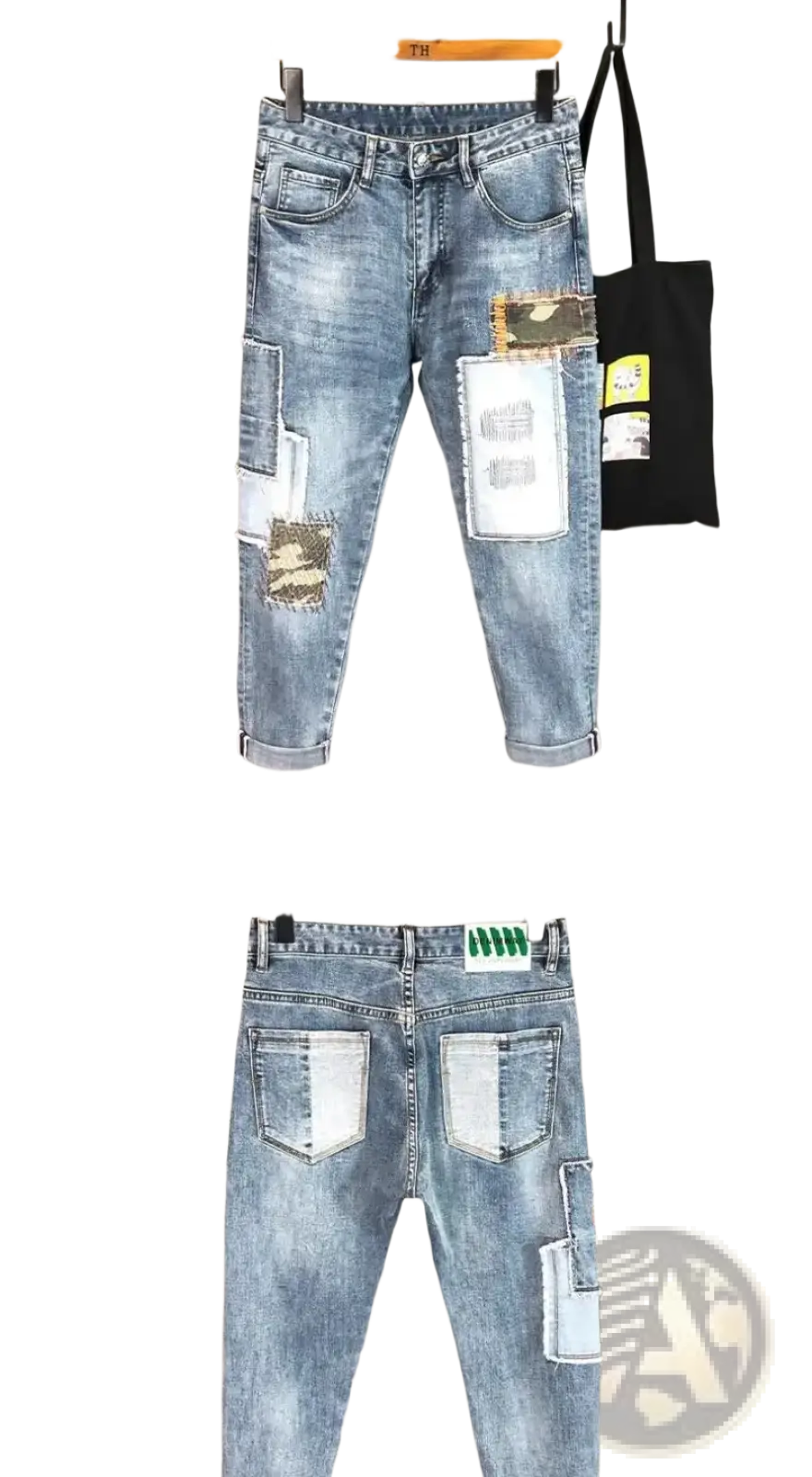 Distressed slim fit light wash denim jeans with patchwork details and contrasting fabric panels