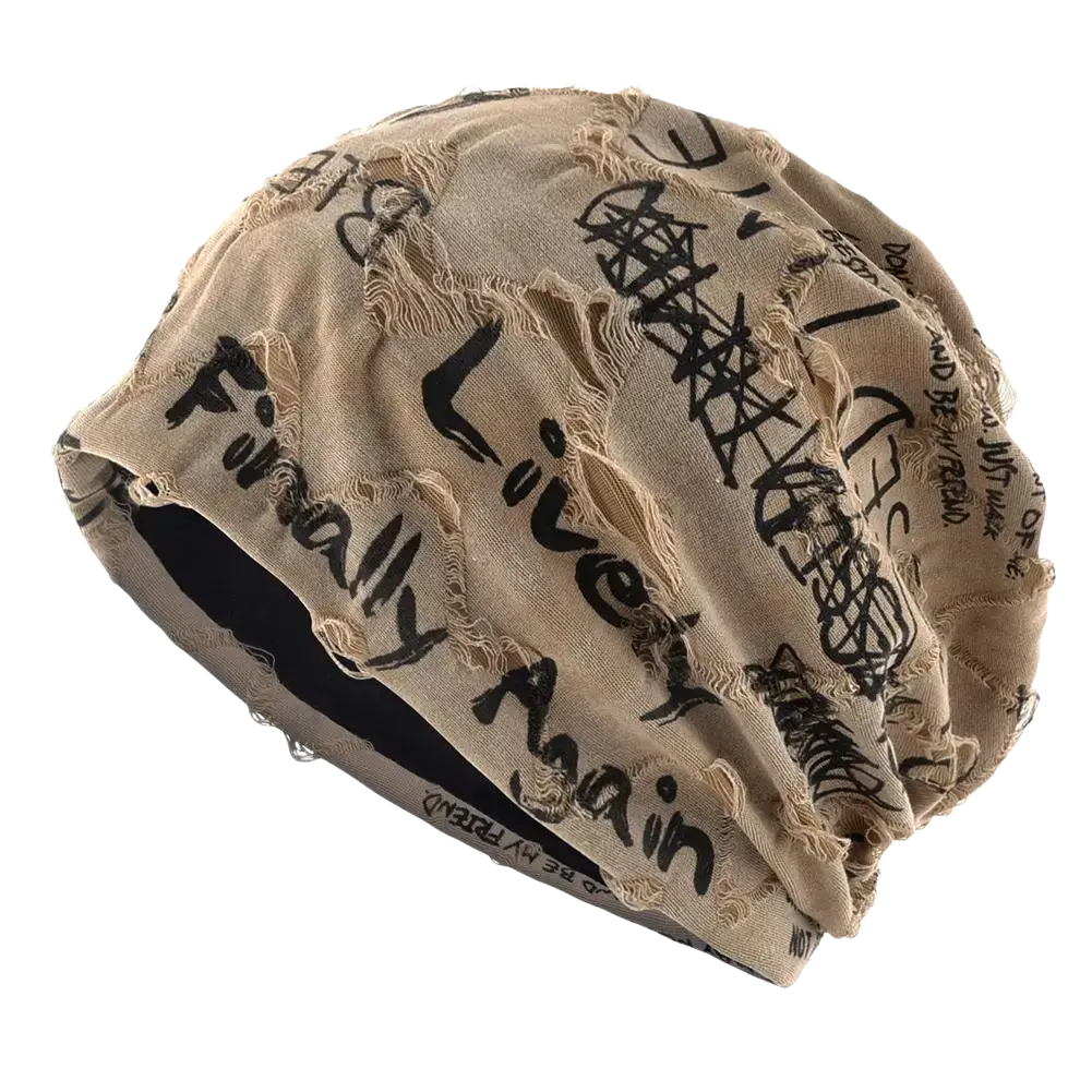 Beige distressed fabric streetwear beanie hat with black graffiti style text and frayed edges