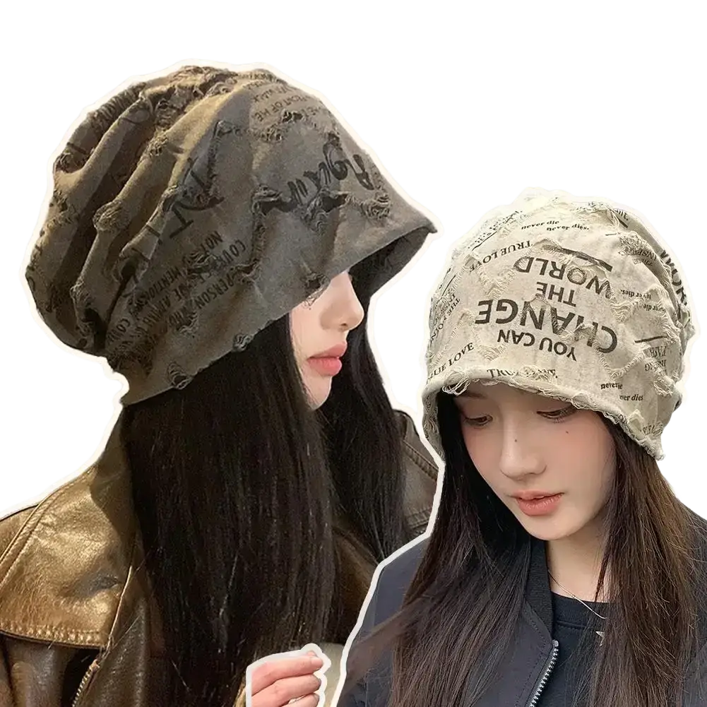 Two distressed streetwear beanie hats in olive green and beige featuring black and dark lettering for casual wear