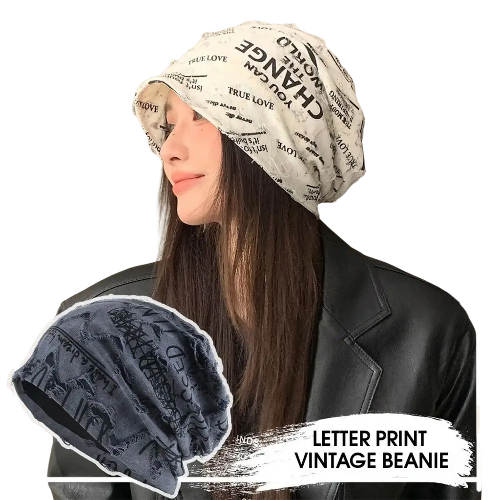A white vintage beanie with black lettering and distressed texture designed for streetwear fashion